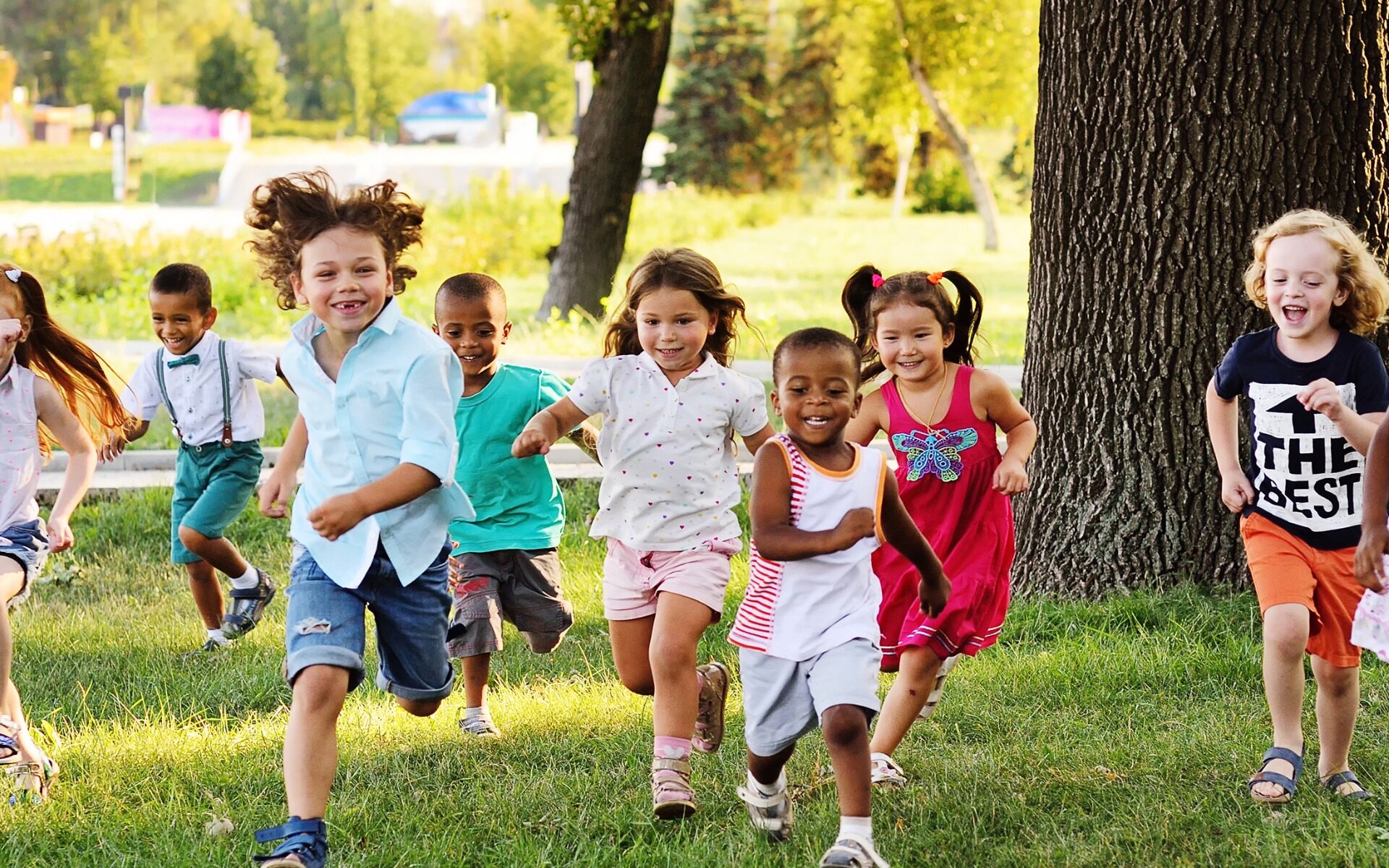 Happy kids running in a park